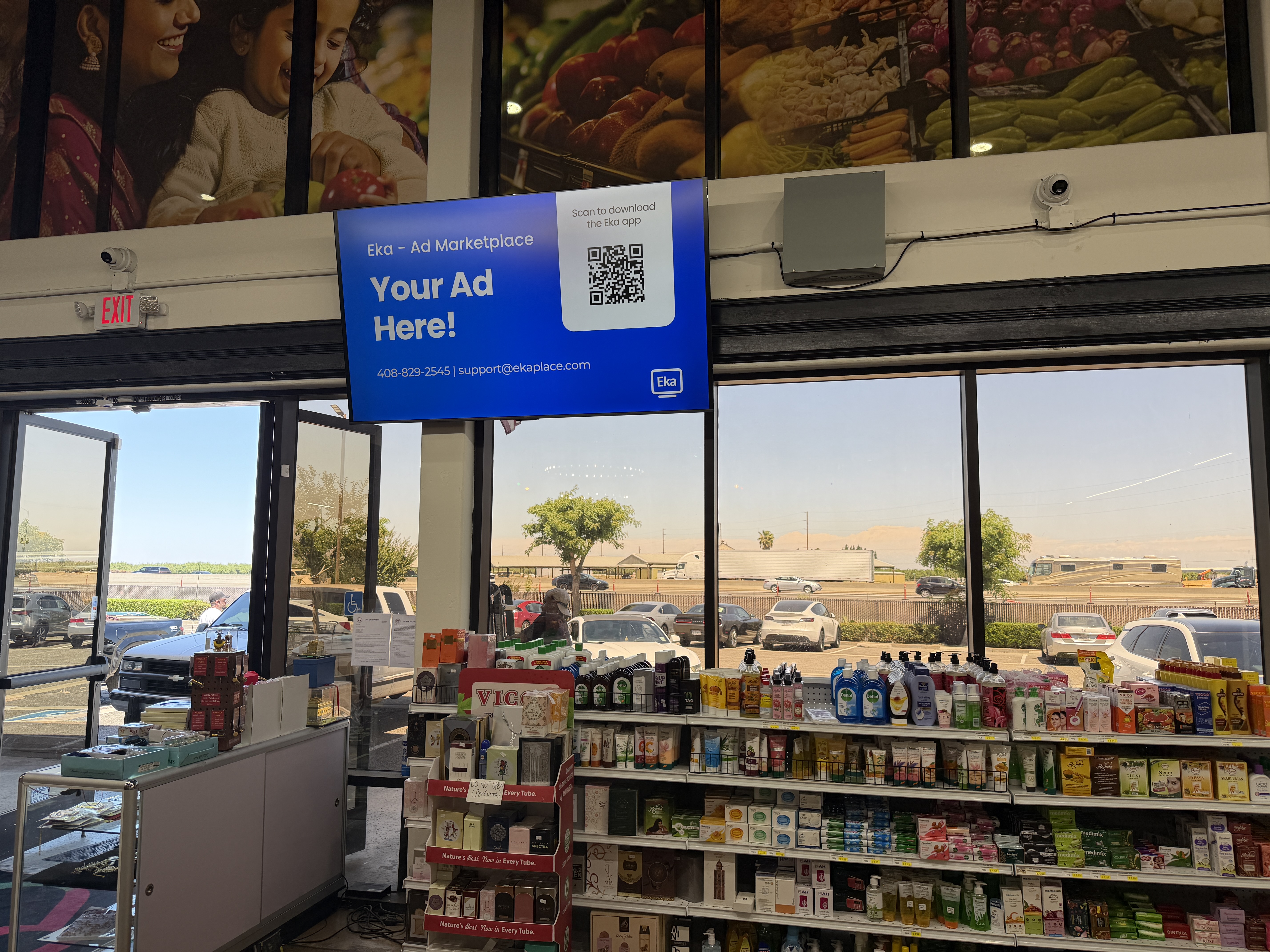 Live advertiser running on an Eka screen inside Raunak Bazaar Indian grocery store